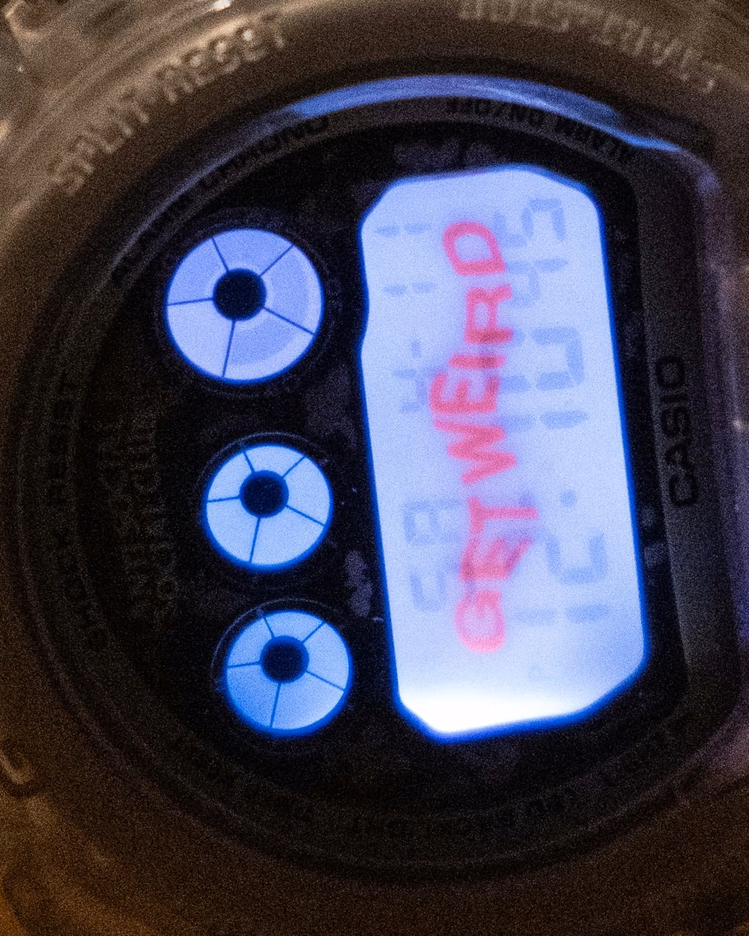 Надпись GET WEIRD на дисплее G-Shock Anti Social Social Club